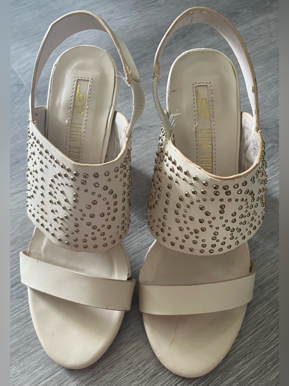 Leila Stone women’s cream wedges with gold accents